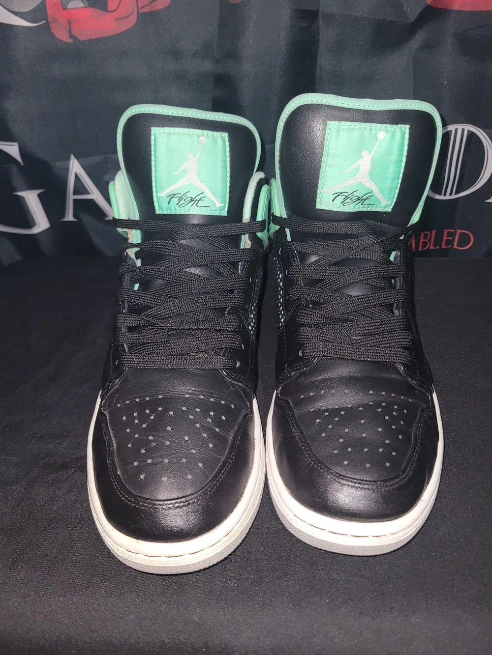 Jordan 1 Retro Black and Mint Green Glow Hi-Top Sneakers